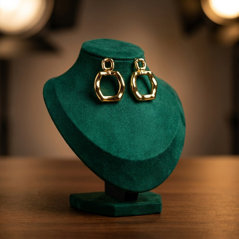 Revolte gold earrings