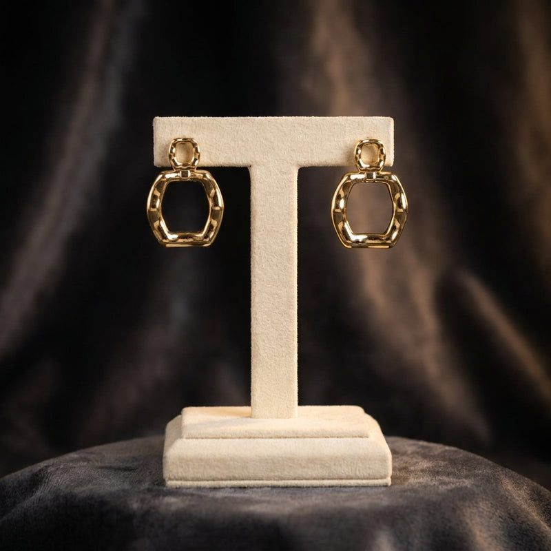 Revolte gold earrings