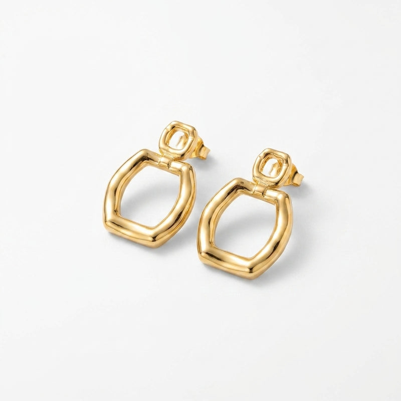 Revolte gold earrings